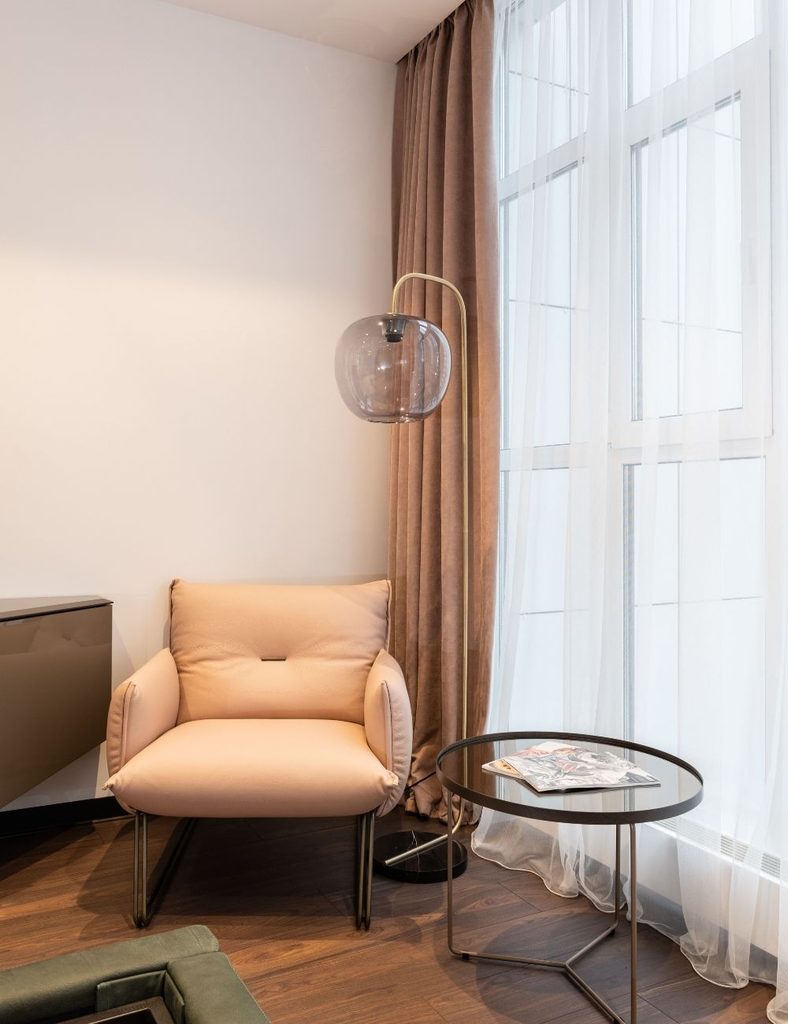 Use Floor-to-Ceiling Sheer Curtains